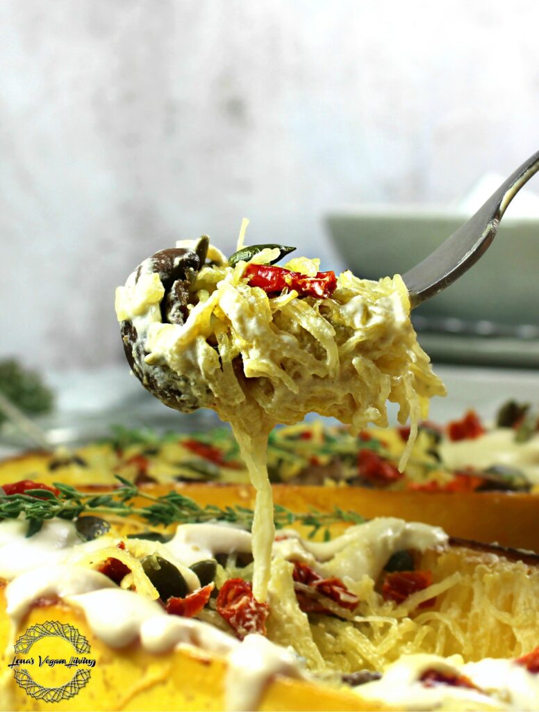 Festive Spaghetti Squash with Mushrooms, Sundried Tomatoes and Cashew Sauce is a perfect addition to this Holiday Season! Vegan - Gluten Free