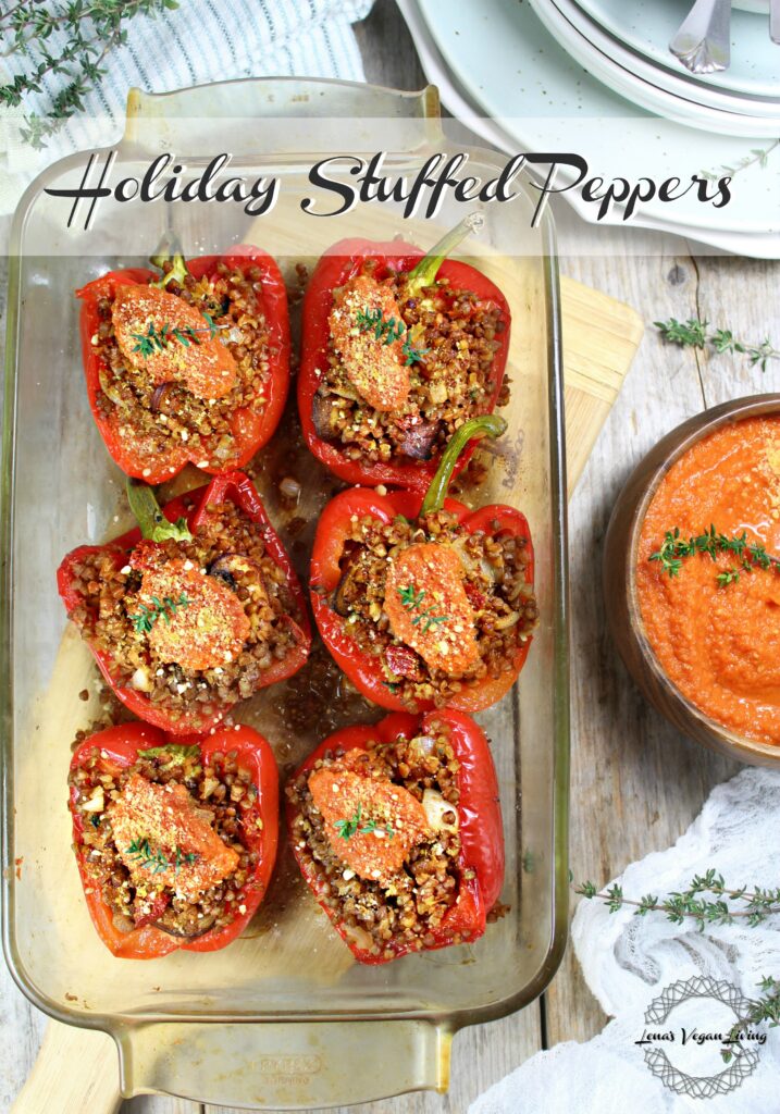 Holiday Stuffed Peppers with Buckwheat, Mushrooms and Sundried Tomatoes, Served with Tomato Sauce. Truly appetizing, beautiful and healthy. Vegan - Gluten Free