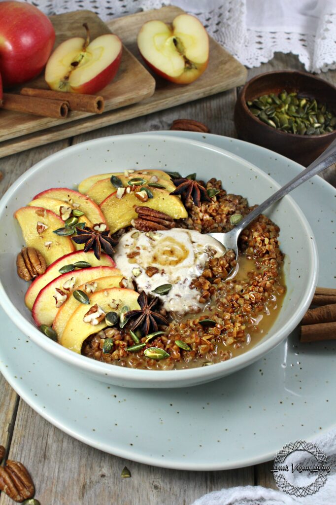 Buckwheat Porridge with Caramelized Apple, Spiced Maple Syrup, Roasted Pumpkin Seeds and Pecans. Vegan - Gluten Free - Refined Sugar Free