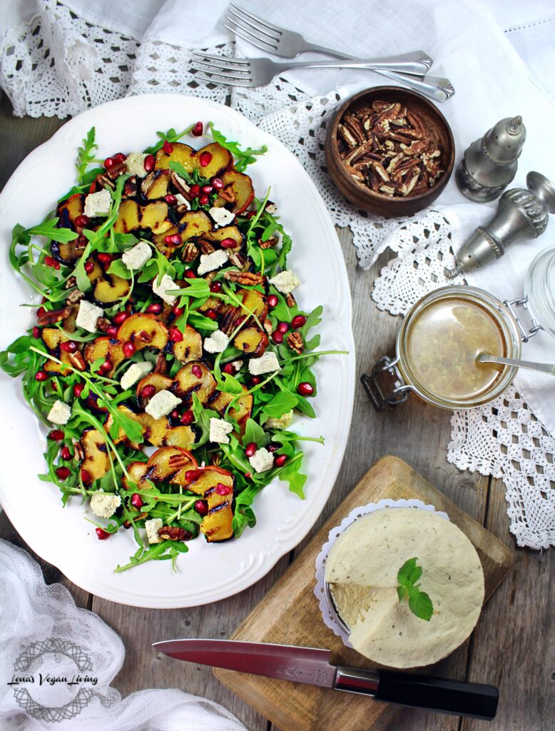 Grilled Acorn Squash Salad with Baby Arugula, Pomegranate and Almond Feta, could be a wonderful addition to your Holiday table. Vegan - Gluten Free