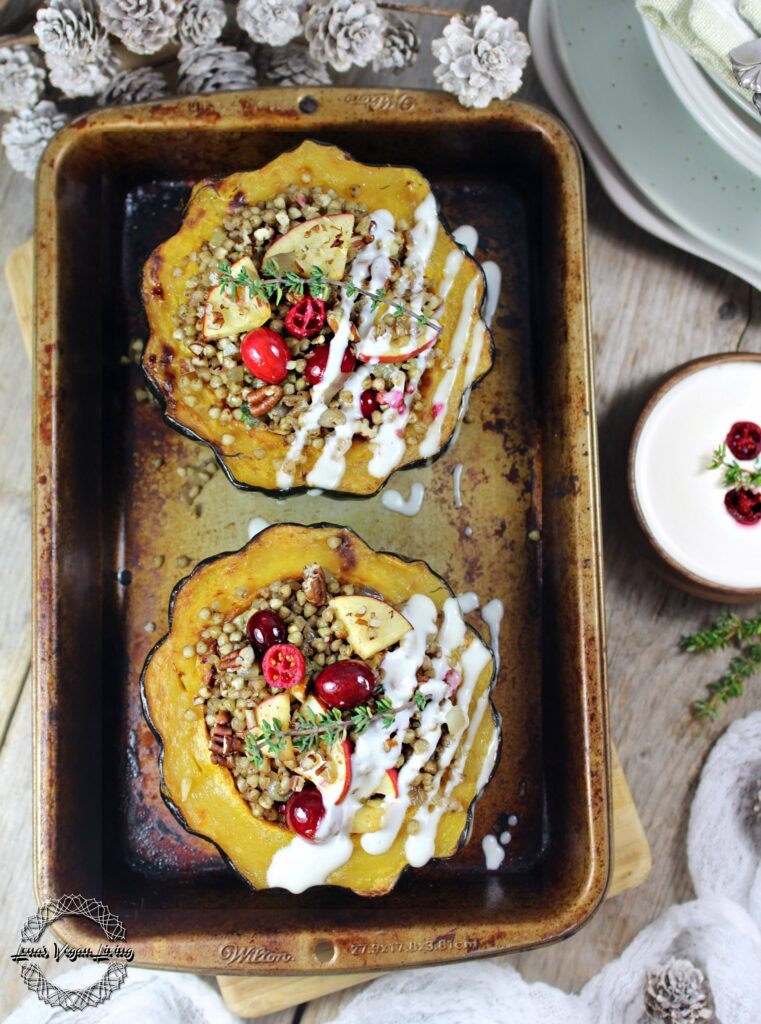 Stuffed Acorn Squash with Buckwheat, Cranberries, Apples and Pecans, Drizzled with Creamy Dressing. Vegan – Gluten Free – Refined Sugar free