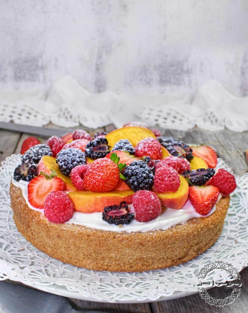Vanilla Cake with Coconut Cream, Peaches & Berries is delicious, fluffy & moist dessert for any occasion. Vegan - Gluten Free - Refined Sugar Free